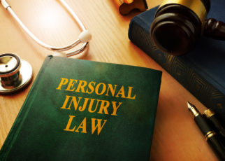 Personal injury law book on a table.